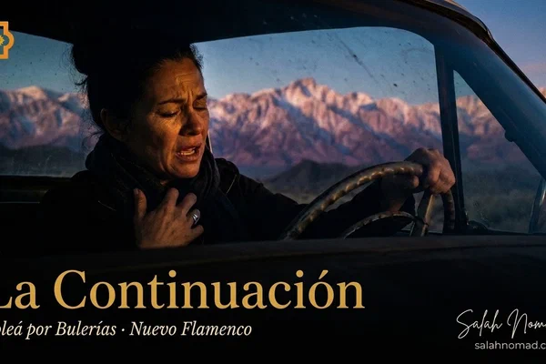 A flamenco cantaora mid-quejío, the Sierra Nevada glowing like vertebrae through a dusty windshield behind her.