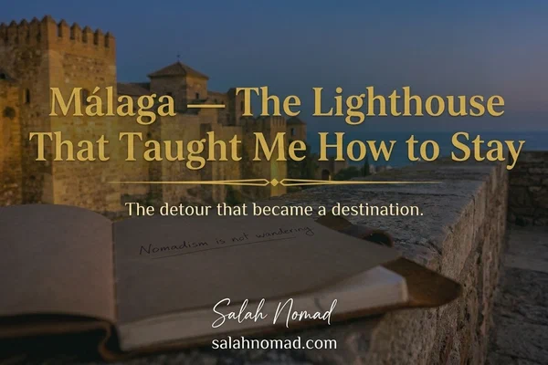 The Alcazaba of Málaga at sunset, ochre stone glowing against the Mediterranean. A Moleskine notebook lies open on a stone parapet, inscribed with a single handwritten line.