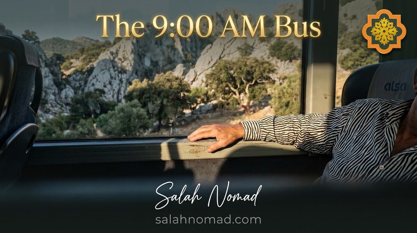 View from inside an Alsa bus, through a large side window, of the Sierra Sur mountains in early morning July light. Limestone ridges, cork oaks, wild olive trees. A forearm in a zebra-striped sleeve rests on the windowsill.