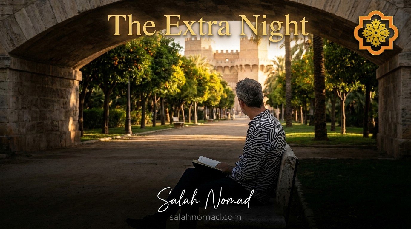 The Turia Gardens at sunset, a lone man in his forties with salt-and-pepper hair wearing a classic long-sleeved zebra-striped shirt sits on a bench under a stone bridge, a Moleskine notebook open on his lap, the Serranos Tower visible in the distance.