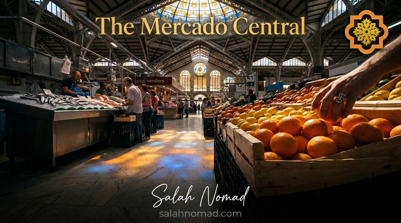 Inside the Mercado Central of Valencia, sunlight streaming through the stained-glass dome, crates of oranges and fresh seafood, a hand with a silver Amazigh ring reaching toward a naranja.